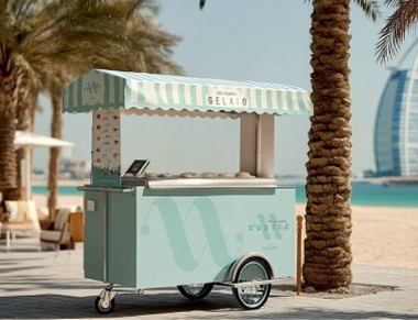NUANCE gelato cart on the beach beside the palms in Dubai